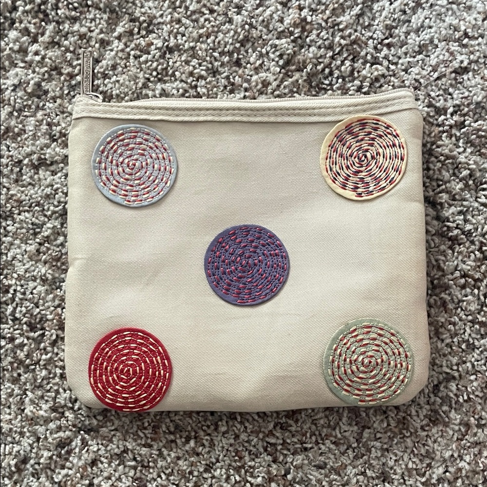 Stylish Cream Clutch with Colorful Accents